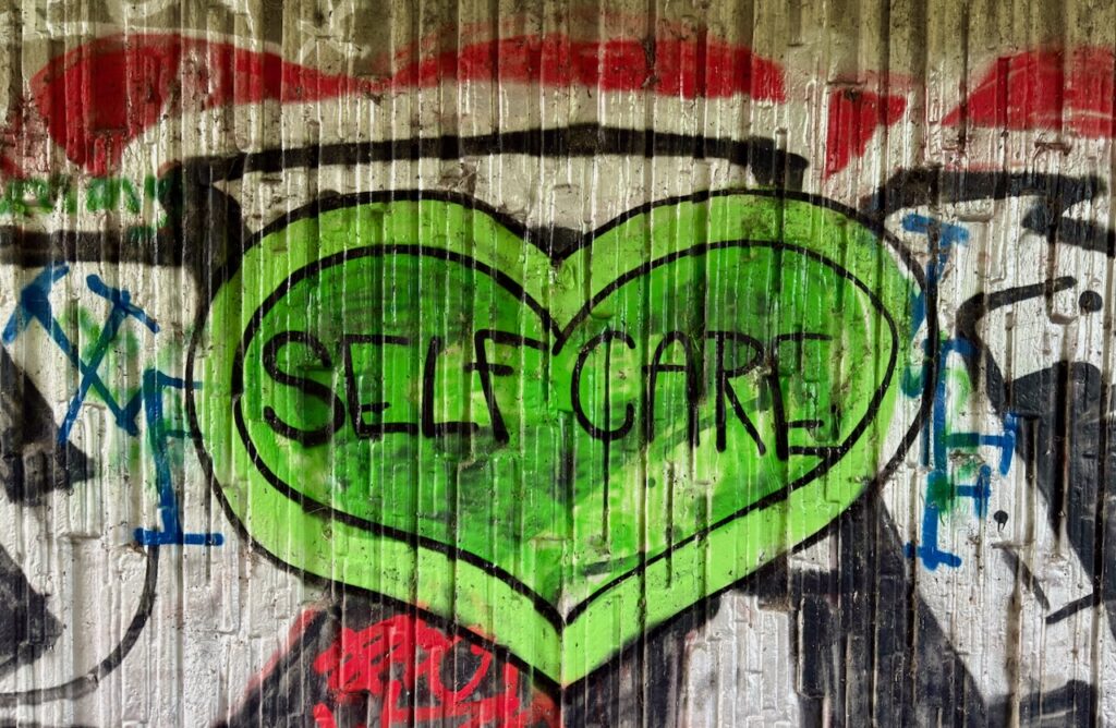 Self Care graffiti found by the River Kelvin in Glasgow
